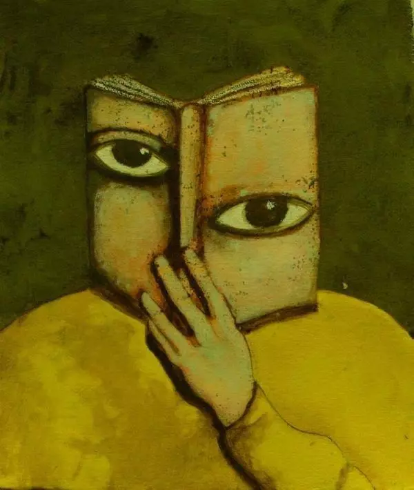 hombre viendo a traves de un libro